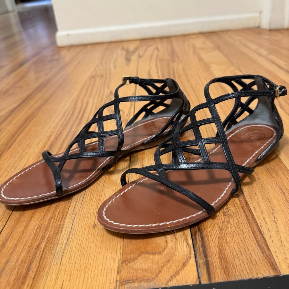 Tory Burch Amalie flat black sandals.